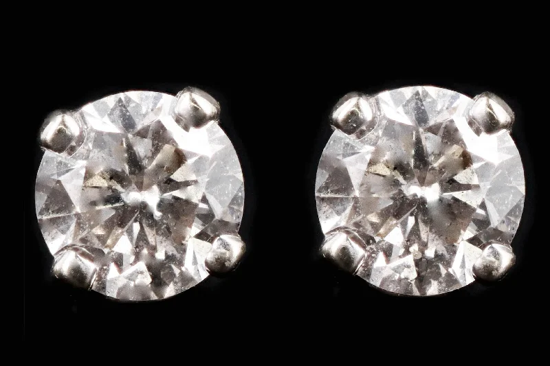 Modern Platinum .25 Carat Total Weight Round Brilliant Diamond Stud Earrings