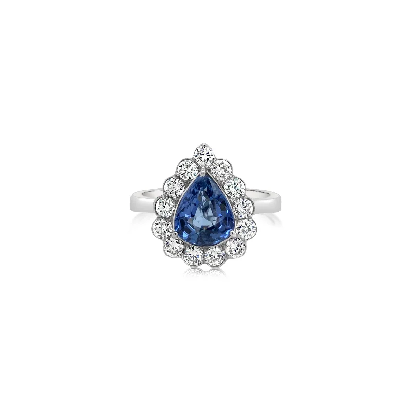 White Gold Diamond Ring With Pear Shape Sapphire Center